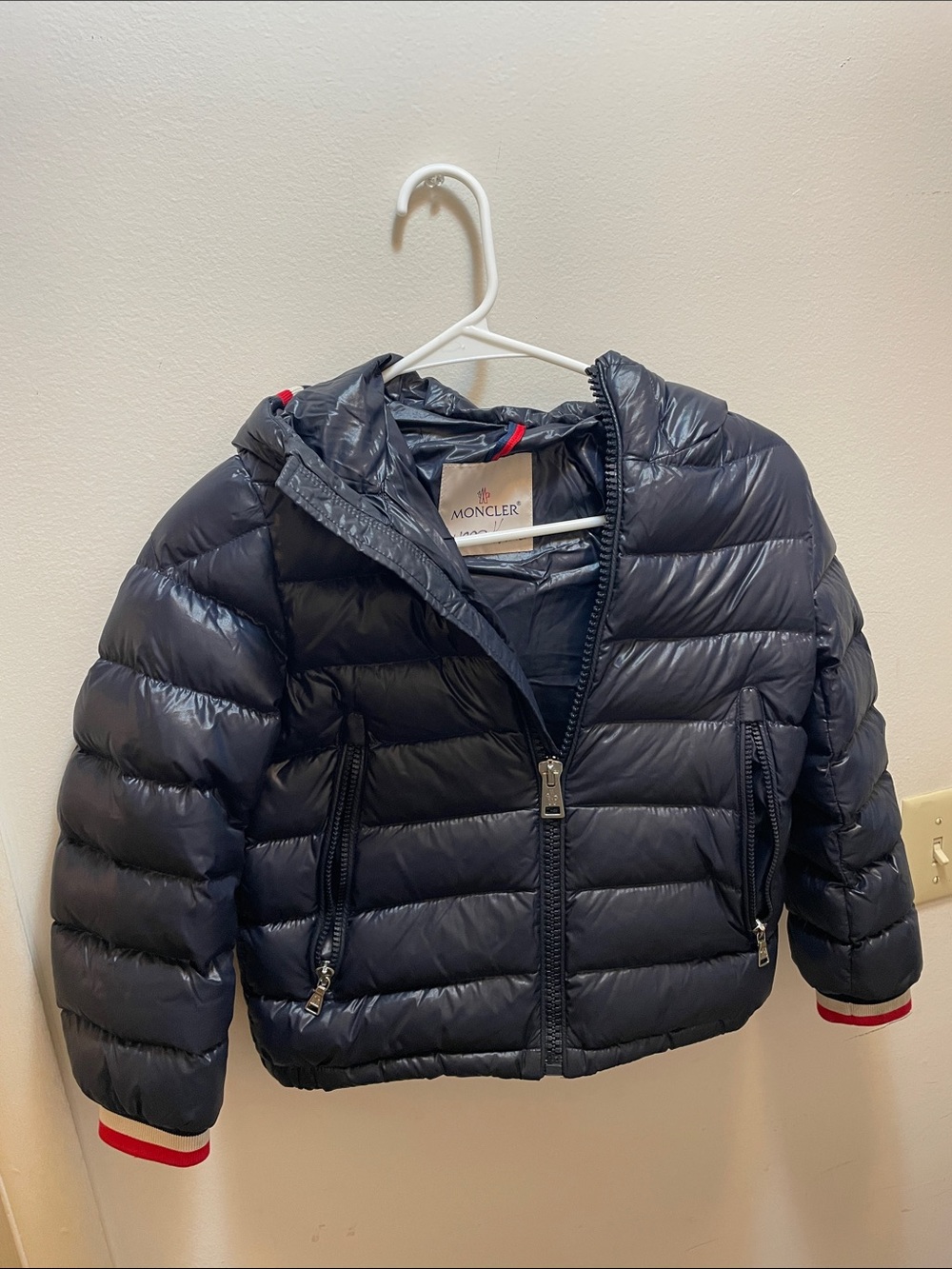 Size: Kids 8A / 130 cm. Authentic Moncler navy blue down puffer jacket with hood